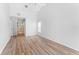 Empty bedroom featuring light hardwood floors and a ceiling fan at 11308 Pocket Brook Dr, Tampa, FL 33635