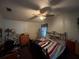 Inviting bedroom with a ceiling fan, dresser, and closet, awaits a new owner at 12205 Greenland Dr, Riverview, FL 33579