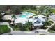 Aerial view of community clubhouse, pool, playground, and tennis courts at 12829 Tortoise Shell Pl, Riverview, FL 33579