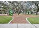 Well-maintained playground nestled under mature shade trees at 12829 Tortoise Shell Pl, Riverview, FL 33579