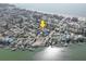 Scenic aerial view of a beautiful coastal community, advantageously located near the beach and waterfront at 13313 2Nd E St, Madeira Beach, FL 33708