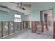 Living room area featuring terrazzo flooring and updated electrical outlets at 13313 2Nd E St, Madeira Beach, FL 33708