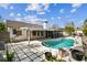 Backyard with pool, patio and exterior storage at 15109 Winterwind Dr, Tampa, FL 33624