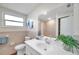 Bathroom featuring tile accents, a large mirror, and a combination shower and tub at 1530 Clair Mel Cir, Tampa, FL 33619