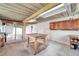 Well-lit garage with workbench areas and storage, offering a practical workspace at 1530 Clair Mel Cir, Tampa, FL 33619