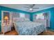 Bright bedroom with decorative coastal decor, a ceiling fan, and ample natural light at 18675 Us Highway 19 N # 320, Clearwater, FL 33764