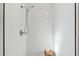 Bright shower with white subway tile, sleek fixtures, and a modern design at 2008 Harvard Ave, Dunedin, FL 34698