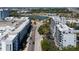 Stunning aerial view overlooking modern apartments, road, and waterfront at 201 W Laurel St # 507, Tampa, FL 33602