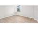 Bedroom with tiled floors, neutral paint and a window with city views at 201 W Laurel St # 507, Tampa, FL 33602