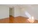 Bedroom with hardwood floors, and bright walls at 2101 Sunset Point Rd # 1003, Clearwater, FL 33765