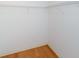 Walk in closet with shelving and wood floor at 2101 Sunset Point Rd # 1003, Clearwater, FL 33765