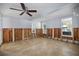 Bedroom featuring a ceiling fan, windows, and exposed framing, perfect for renovation at 2460 Baywood E Dr, Dunedin, FL 34698