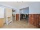 Kitchen featuring a doorway leading into another room, awaiting renovation and new design at 2460 Baywood E Dr, Dunedin, FL 34698