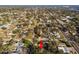 The property is nestled within a community of homes, with a red arrow marking its location among the lush landscape at 270 41St Ne Ave, St Petersburg, FL 33703