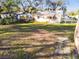 This generous backyard features a well-maintained lawn, fencing, and a cozy outdoor space at 270 41St Ne Ave, St Petersburg, FL 33703