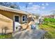 View of the patio area, with seating, adjacent to the home at 270 41St Ne Ave, St Petersburg, FL 33703