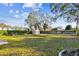 Spacious backyard featuring a grassy lawn and storage shed at 270 41St Ne Ave, St Petersburg, FL 33703