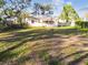 This fenced backyard features a well-maintained lawn, offering a private outdoor area at 270 41St Ne Ave, St Petersburg, FL 33703