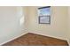 Bedroom featuring wood-look flooring, and a window with blinds at 270 41St Ne Ave, St Petersburg, FL 33703