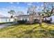 Attractive single-story home with white-framed windows, a manicured lawn, and a convenient covered entryway at 270 41St Ne Ave, St Petersburg, FL 33703