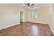 Inviting living area with wood-look flooring, natural light, and neutral walls at 270 41St Ne Ave, St Petersburg, FL 33703