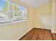 Bright room with light-filled window and wood-look floors at 270 41St Ne Ave, St Petersburg, FL 33703