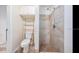 Bathroom with stylish tiled shower and built-in shelving at 3017 Sanchez St # 1/2, Tampa, FL 33605