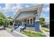 Charming craftsman-style home featuring blue and gray painted finishes, a welcoming front porch, and well-manicured landscaping at 3017 Sanchez St # 1/2, Tampa, FL 33605