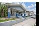 Charming craftsman-style home featuring blue and gray painted finishes, a welcoming front porch, and well-manicured landscaping at 3017 Sanchez St # 1/2, Tampa, FL 33605