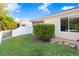 Home has well-manicured backyard with white fencing at 31031 Whitlock Dr, Wesley Chapel, FL 33543