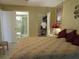 Bedroom with ensuite bathroom and closet with ample space at 3161 Lake Pine S Way # F1, Tarpon Springs, FL 34688