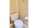 Simple yet functional toilet, featuring a clean design and complemented by a paper holder at 3320 Broken Bow Dr, Land O Lakes, FL 34639