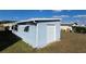 Detached storage shed offers secure storage and a clean exterior at 36830 Kimela Ave, Zephyrhills, FL 33542