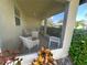 This screened patio features neutral tile flooring and overlooks a lawn, offering a perfect spot for relaxation at 3917 103Rd N Ave, Clearwater, FL 33762