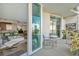 Inviting balcony with seating offering a view of the interior living space at 450 Knights Run Ave # 1005, Tampa, FL 33602