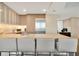 Contemporary kitchen equipped with sleek appliances and bar-style seating at 450 Knights Run Ave # 1005, Tampa, FL 33602