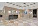 Spacious lobby with modern tile flooring, elegant furniture, and stylish decor, creating a welcoming entrance at 450 Knights Run Ave # 1005, Tampa, FL 33602