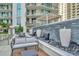 Chic lounge area with contemporary furniture and serene fountains, ideal for relaxation amidst elegant surroundings at 450 Knights Run Ave # 1005, Tampa, FL 33602