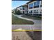 Apartment complex with landscaped walkways at 4715 Jasper Dr # 208, New Port Richey, FL 34652