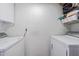 Laundry room with modern washer and dryer at 4965 Puritan Cir # 401, Tampa, FL 33617