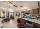 Open kitchen featuring a breakfast bar and seamless transition into the adjacent living room at 539 Freeport N Ave, St Petersburg, FL 33702