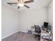 Bedroom featuring neutral walls and a ceiling fan, perfect for a home office or guest room at 5446 Blue Azure Dr, Wimauma, FL 33598