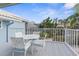 Outdoor balcony with a table and chairs, great for outdoor dining at 6029 Bayway Ct, New Port Richey, FL 34652