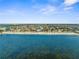 Aerial shot of a beach community with waterfront access and rows of neatly arranged homes at 6029 Bayway Ct, New Port Richey, FL 34652