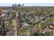 High aerial shot of the neighborhood with downtown city skyline in the distance at 635 13Th Ne Ave, St Petersburg, FL 33701