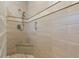 Modern tiled shower with granite bench and upscale fixtures at 635 13Th Ne Ave, St Petersburg, FL 33701