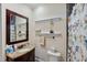 Bathroom vanity with granite countertop and white cabinets at 635 13Th Ne Ave, St Petersburg, FL 33701