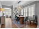 Dining room featuring hardwood floors, statement chandelier, and large windows at 635 13Th Ne Ave, St Petersburg, FL 33701