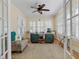 Office with hardwood floors, plantation shutters, and custom built-in desk at 635 13Th Ne Ave, St Petersburg, FL 33701