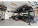 This garage features high ceilings and space for car storage with an automobile lift at 719 21St N Ave, St Petersburg, FL 33704